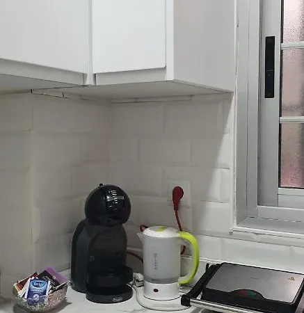 Проживание в семье En Casa De Familia 